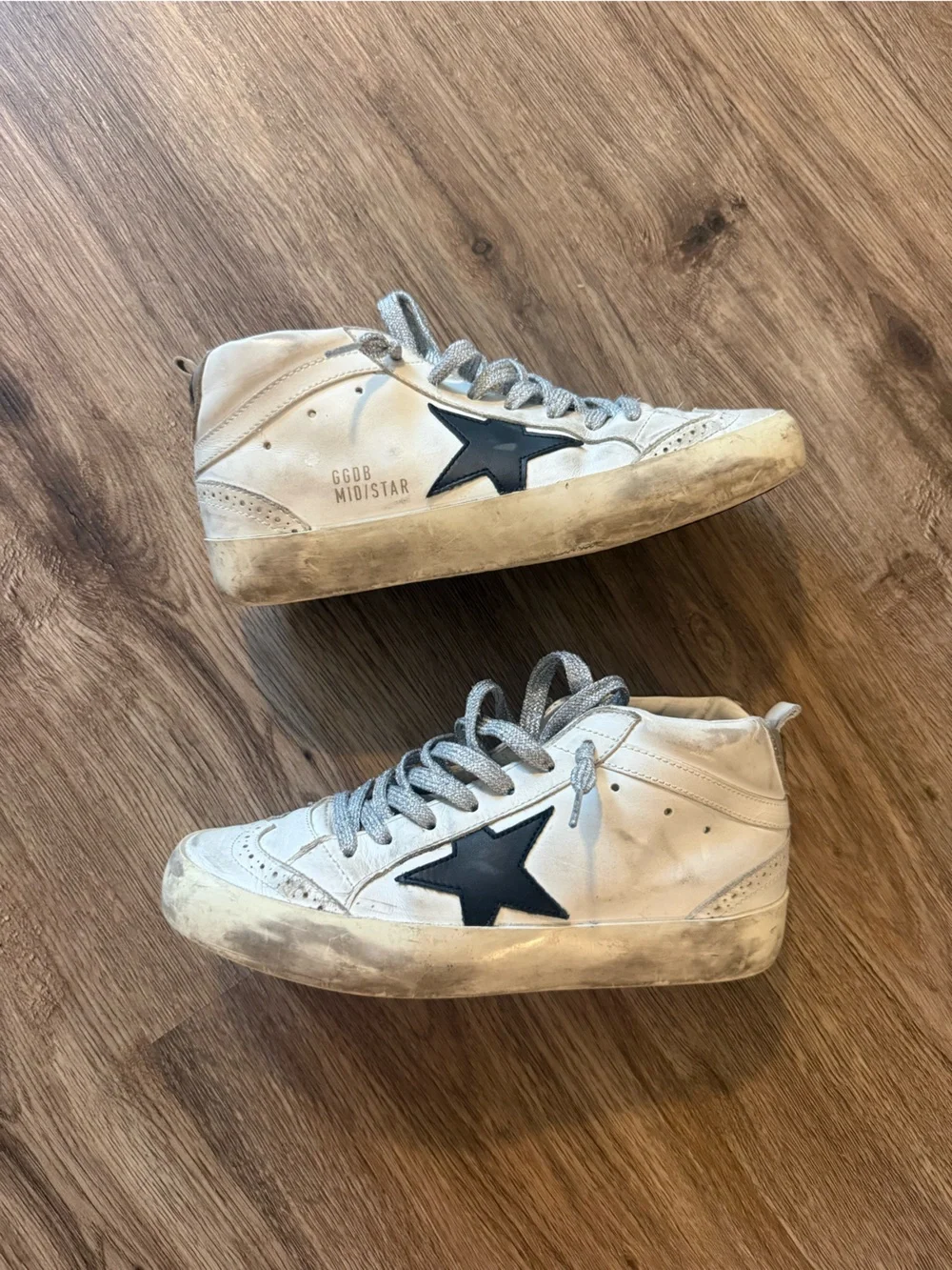 Golden Goose Women’s White Mid-Star Sneakers with Black Star Detail